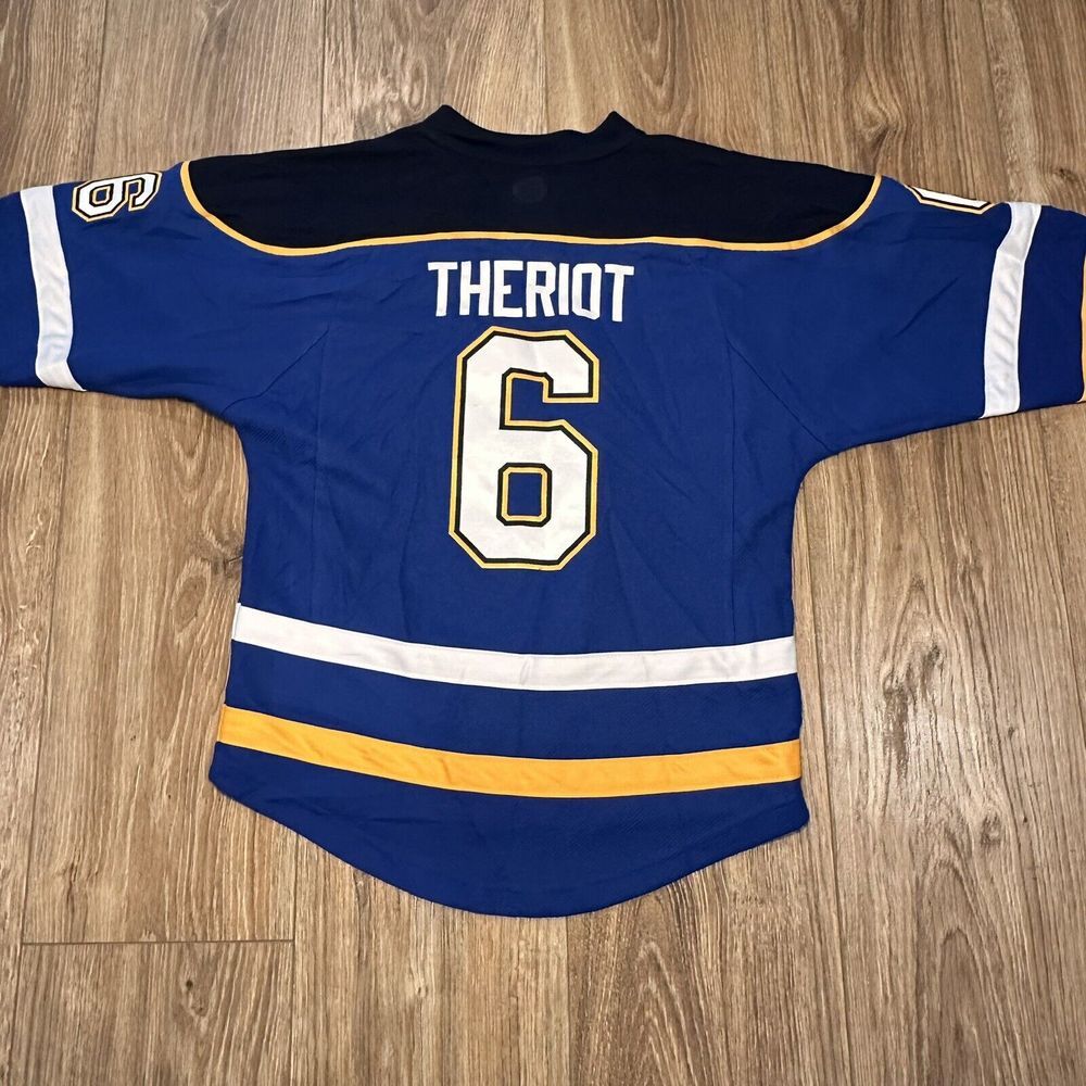 NHL  Hockey St Louis Blues #6 Theriot Kid Size L 10-12 Home Colors‎